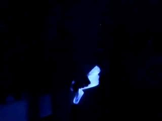Guy playing with blacklight 1/2
