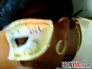 Masked Ebony harlot Wants To Swallow penis
