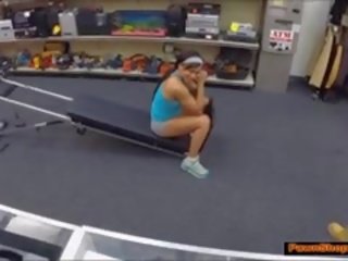 Fit lady Works Out In A Pawn Shop